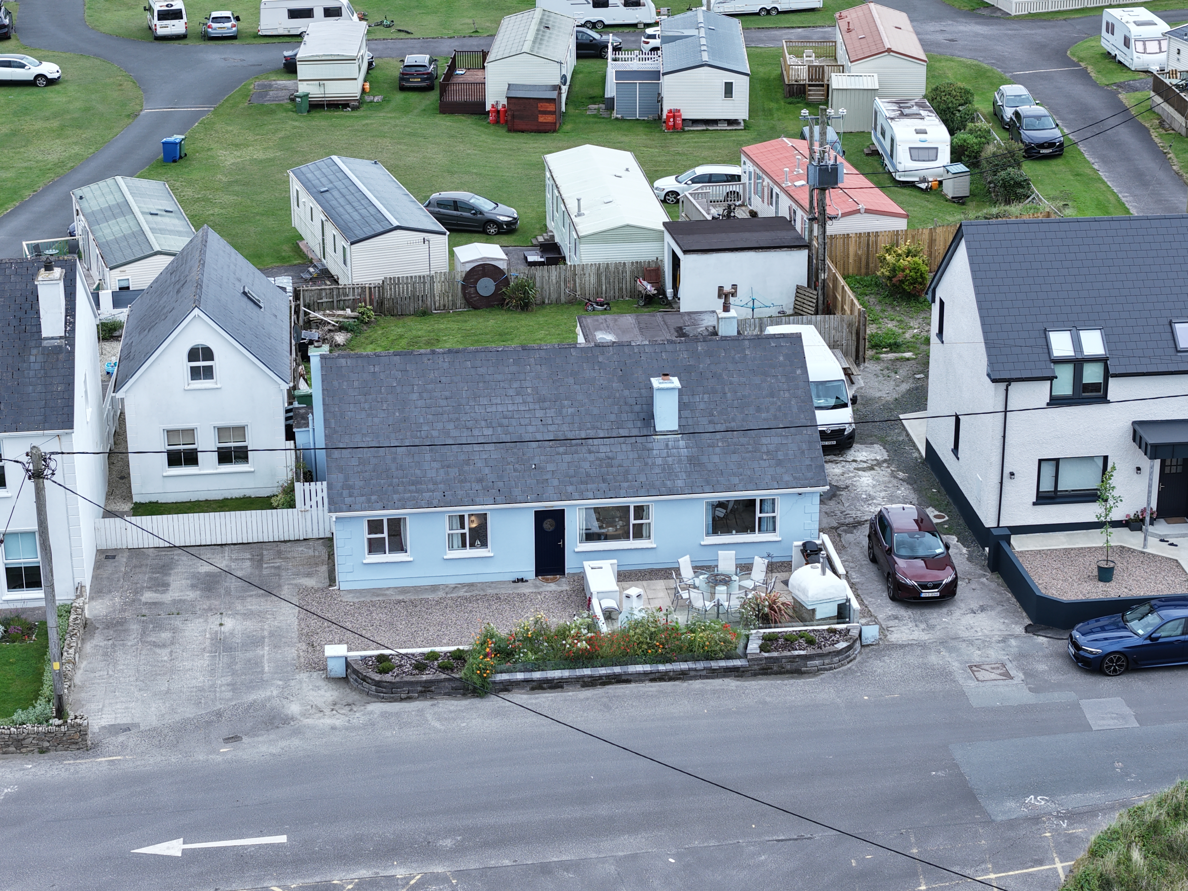 Sandycove cottage, the pale blue bungalow on Portnoo Road